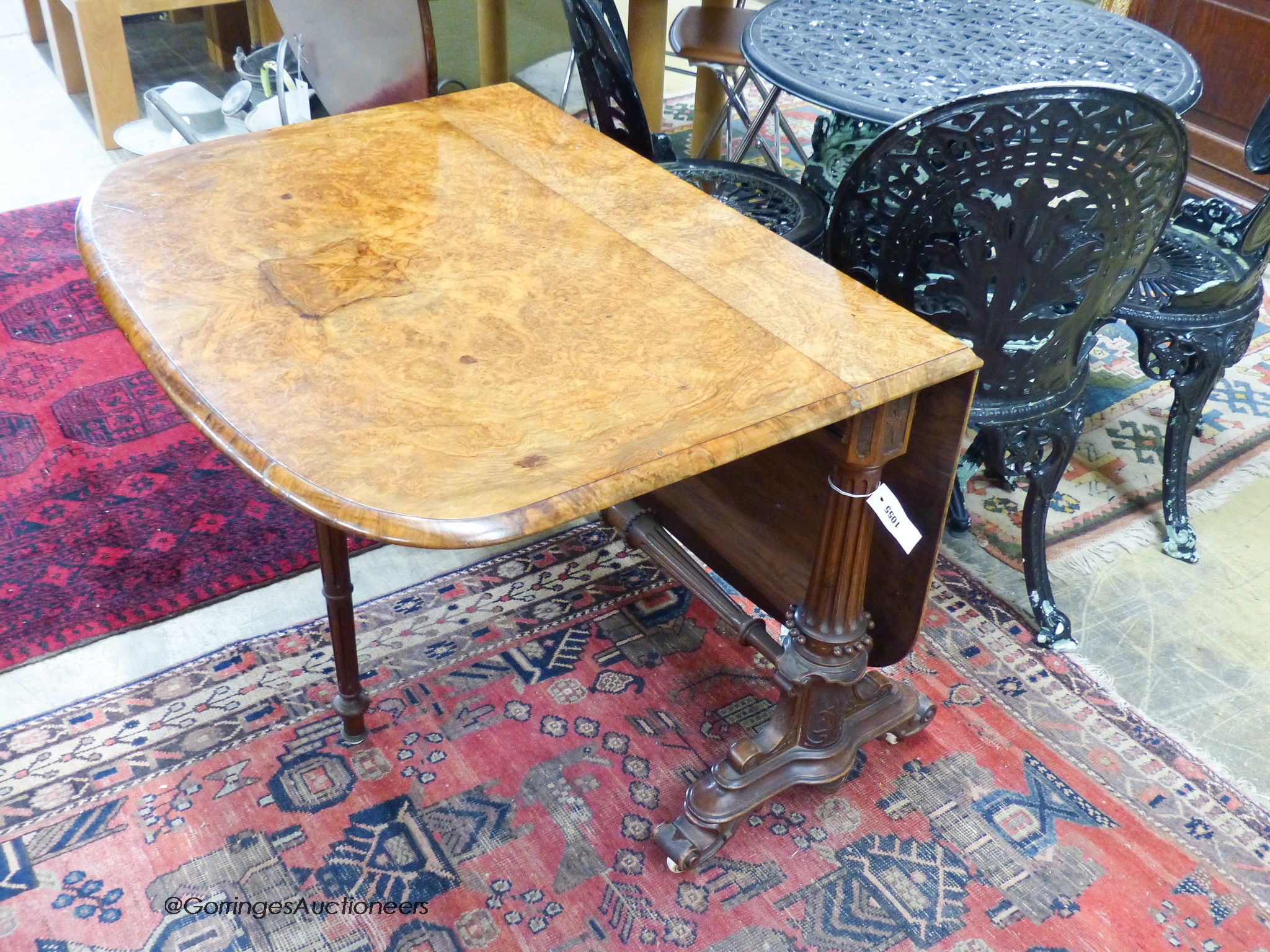 A Victorian burr walnut Sutherland table. 120cm extended, H-66cm.